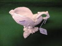 A Royal Worcester shell vase