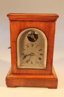 A late Victorian oak cased fusée mantel clock