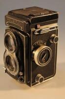 A Rolleiflex TLR camera.