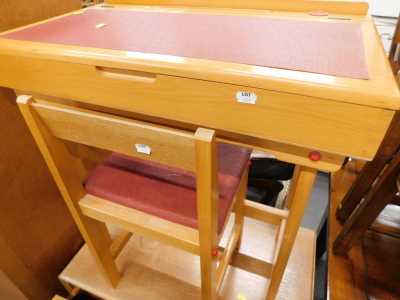 A child's leather top desk, and stool.