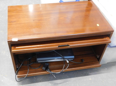 An oak side cabinet, with fall flap and a Sky and HD box.