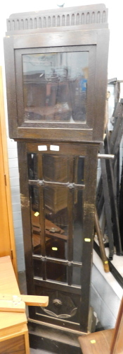 An oak case from a grandmother clock. Buyer Note: VAT is payable on the hammer price of this lot