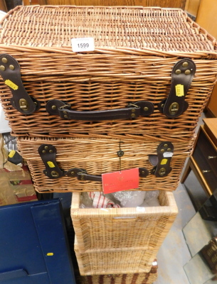 Three wicker picnic hampers, and two storage boxes.