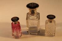 Three Victorian glass dressing table bottles