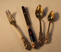A set of French silver gilt nursery flat ware