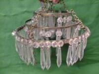 A glass 3-tier chandelier