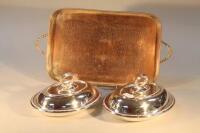 A pair of electro plate oval entree dishes and covers