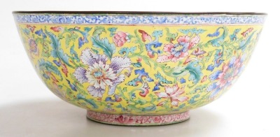 A fine 18thC Qianlong period Chinese polychrome enamel bowl, decorated in delicate famille rose colours with bats, peaches and a long life symbol to the interior; and with scrolling peonies on an Imperial yellow ground to the exterior, the base with phoe - 2