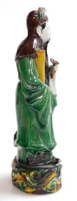 A 19thC Qing dynasty Chinese glazed figure of a scholar, 30cm high. - 4