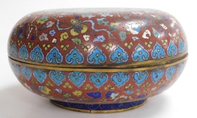 A 19thC Chinese circular compressed cloisonne enamel box, decorated with emblems of flowers and precious objects, on a red ground, the cover with central panel of butterflies and flower heads in polychrome enamels, on blue ground, 11cm high, 24cm diameter - 4