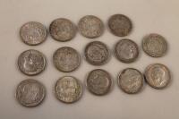 A collection of fourteen George V half crowns
