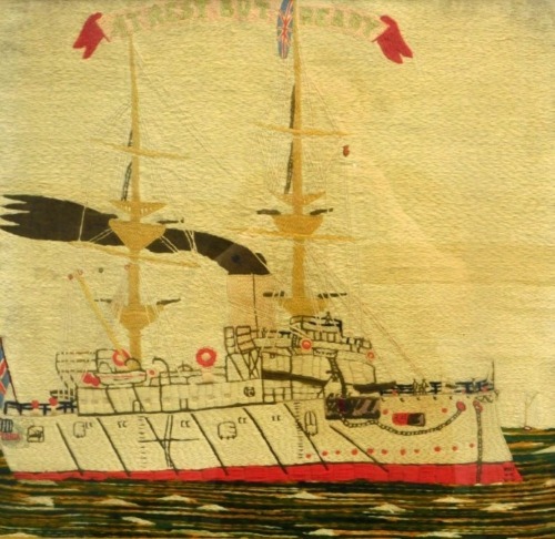 A WW1 period wool needlework. A British Dreadnought battleship "At rest but ready", 53cm x 56cm.