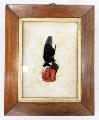 Early 19thC. A military verre eglomise portrait of Captain Caddy, in red and black with white, 15cm x 11cm, in rosewood frame. - 2