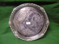 An EPNS salver, engraved with strapwork and foliage, pierced gallery,