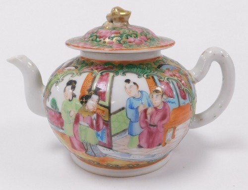 A 19thC Qing dynasty Chinese porcelain miniature teapot, in famille rose Canton style, with figures, birds and flora, the cover with gilt knop, 9cm high.