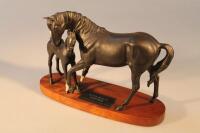 A Beswick figure of Black Beauty and foal on wooden plinth