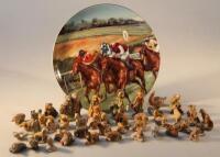 A collection of Wade Whimsies and a Coalport commemorative 1986 racing plate.