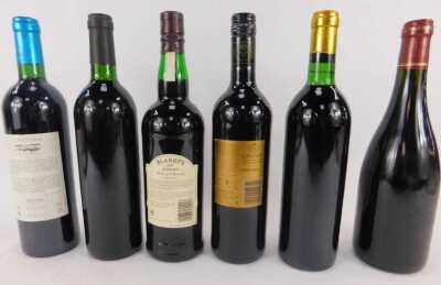 Six bottles of alcohol, comprising Le Grand Chi Medoc 2009, Domaine de la Casa Blanca 2001, Blandy's Duke of Clarence Madeira, Chevalier de Tour 2012, Chateau Pichon Longueville 1983, and Selection Vieille Vigne 1991. - 2