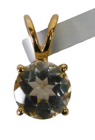 A TGGC pendant, set with an imitation diamond, in a claw basket setting, yellow metal, stamped 10kt, 1cm high, 0.9g all in.