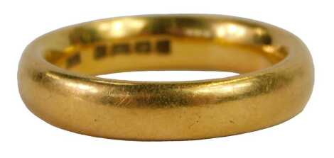 A 22ct gold wedding band, of plain design, ring size R½, 12.6g all in.