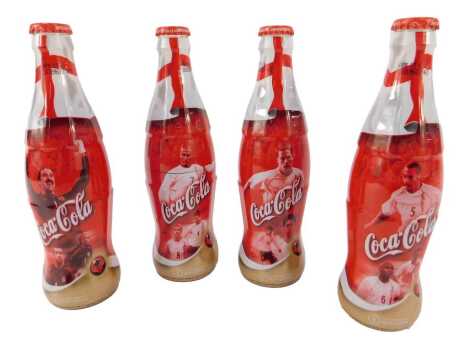 Four commemorative Coca-Cola bottles, for 2002 FIFA World Cup, held in Korea, Japan.