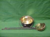 A small brass jampan with iron swing handle together with two ladles