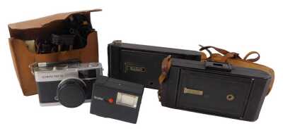 A group of cameras, to include a Kodak number 1A pocket camera, an Olympus Trip 35, etc. (1 tray)