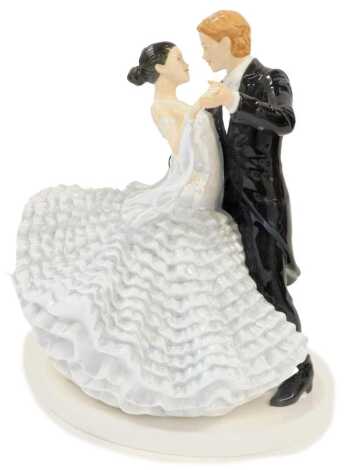 A Royal Doulton porcelain figure group, modelled as The Slow Waltz, HN5444, boxed.