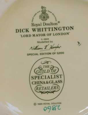Three Royal Doulton pottery character jugs, modelled as Dick Whittington Lord Mayor of London, D6846, Paddy, and Tam O' Shanter, D6632, together with Eyles (Desmond) Royal Doulton Character and Toby Jugs, hardback with dust jacket. (4) - 3