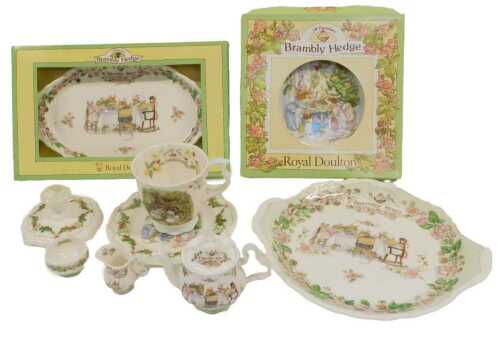 A group of Royal Doulton Brambly Hedge pottery, including a miniature teapot, a mug, a serving dish, an engagement beaker, etc., some boxed. (a quantity)