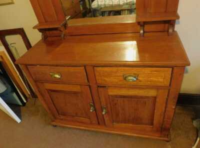 An Edwardian walnut dresser, with mirror back, 184cm high, 120cm wide, 45cm deep. This lot is located offsite. For further details and to arrange a viewing, please call The Bourne Auction Rooms on 01778 422686. - 2