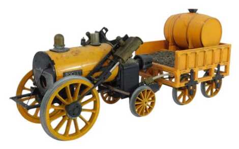 A Hornby tinplate model of The Rocket locomotive, with tender, in yellow, 41cm long overall.