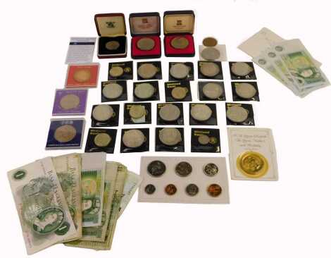 A group of collector's crowns and coins, collector's fifty pence pieces, one pound notes, five pound note with page signature, etc. (1 box)