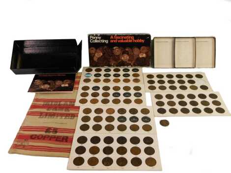 A Penny Collecting Fascinating and Valuable Hobby box, and a quantity of pennies.