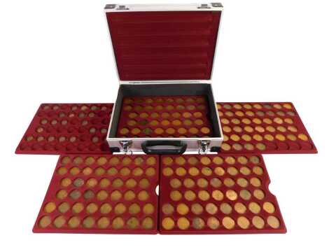 An aluminium coin case, containing a selection of pre-decimal coinage to include farthings and pennies. (1 box)