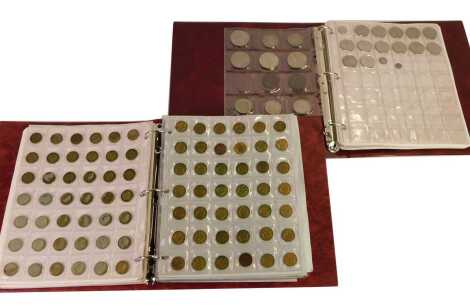 Two coin albums containing a quantity of 1940s and later half crowns, threepenny bits, pennies, half pennies, etc. (2 albums)