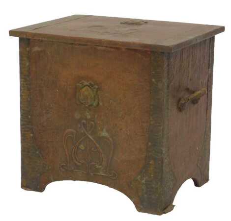 A brass embossed Art Nouveau coal box.