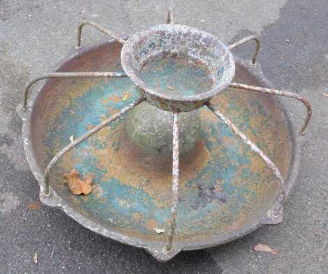 A cast metal animal feeder, 70cm diameter.