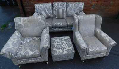 An Alston's Upholstery three seater sofa, together with two matching armchairs and a footstool, each upholstered in a foliate fabric, 187cm wide. - 2