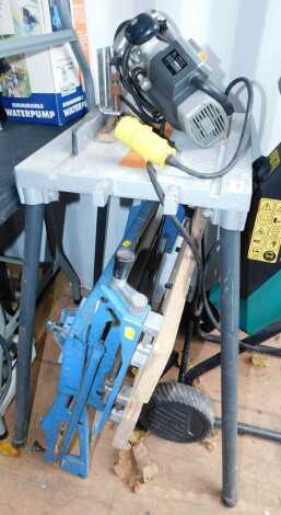 A Workmate, together with an ELU 110v router. (2)