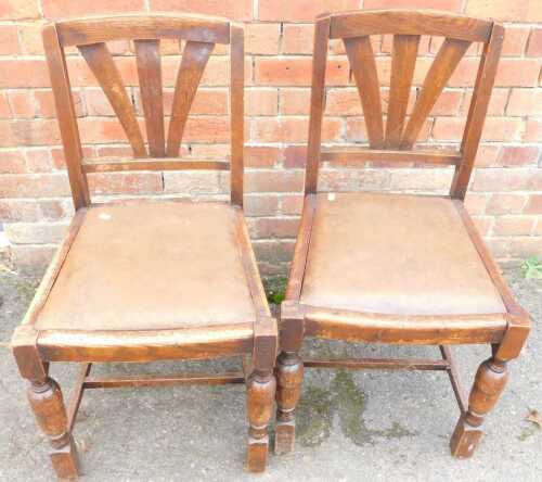 Two oak dining chairs, with drop-in seats.