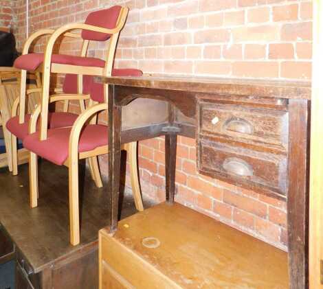 A 20thC oak desk, the rectangular top above a kneehole, flanked by two drawers on square legs, 69cm high, 88cm wide, 51cm deep, together with three office chairs. (4) The upholstery in this lot does not comply with the 1988 (Fire & Fire Furnishing) Regula