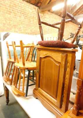 A group of furniture, including an oak corner cabinet, three pine dining chairs, each with a turned back, solid seat, on turned legs united by H stretcher, etc. (a quantity) The upholstery in this lot does not comply with the 1988 (Fire & Fire Furnishing)