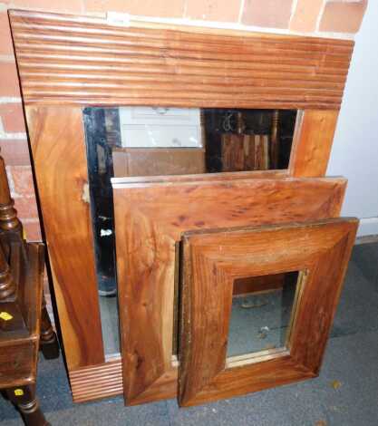 A group of Eastern hardwood framed wall mirrors, the largest 101cm x 70cm.