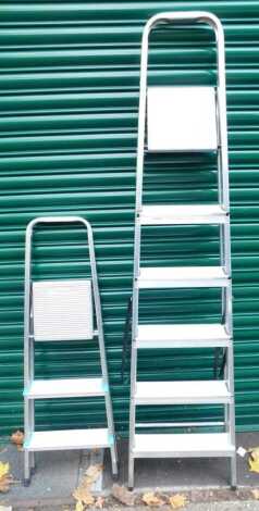 Two aluminium A frame ladders.