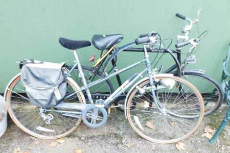 A Raleigh Rhapsody lady's bicycle, together with a Raleigh Chiltern bicycle, in black trim.