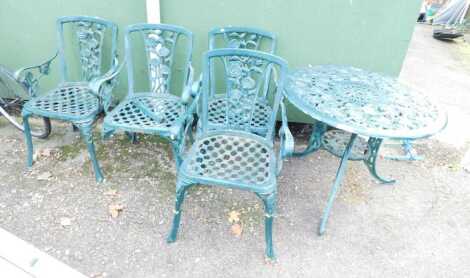 A painted cast metal garden set, comprising table, 68cm high, and four chairs.