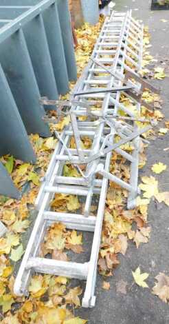 An aluminium extending stepladder, together with various Easireach ladder stays.