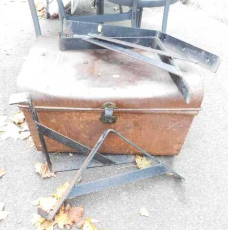 A domed metal trunk, together with various black painted metal gate arms.