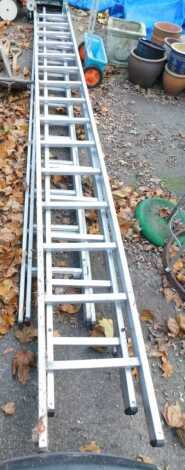 Two aluminium extending ladders, together with a garden spreader. (3)